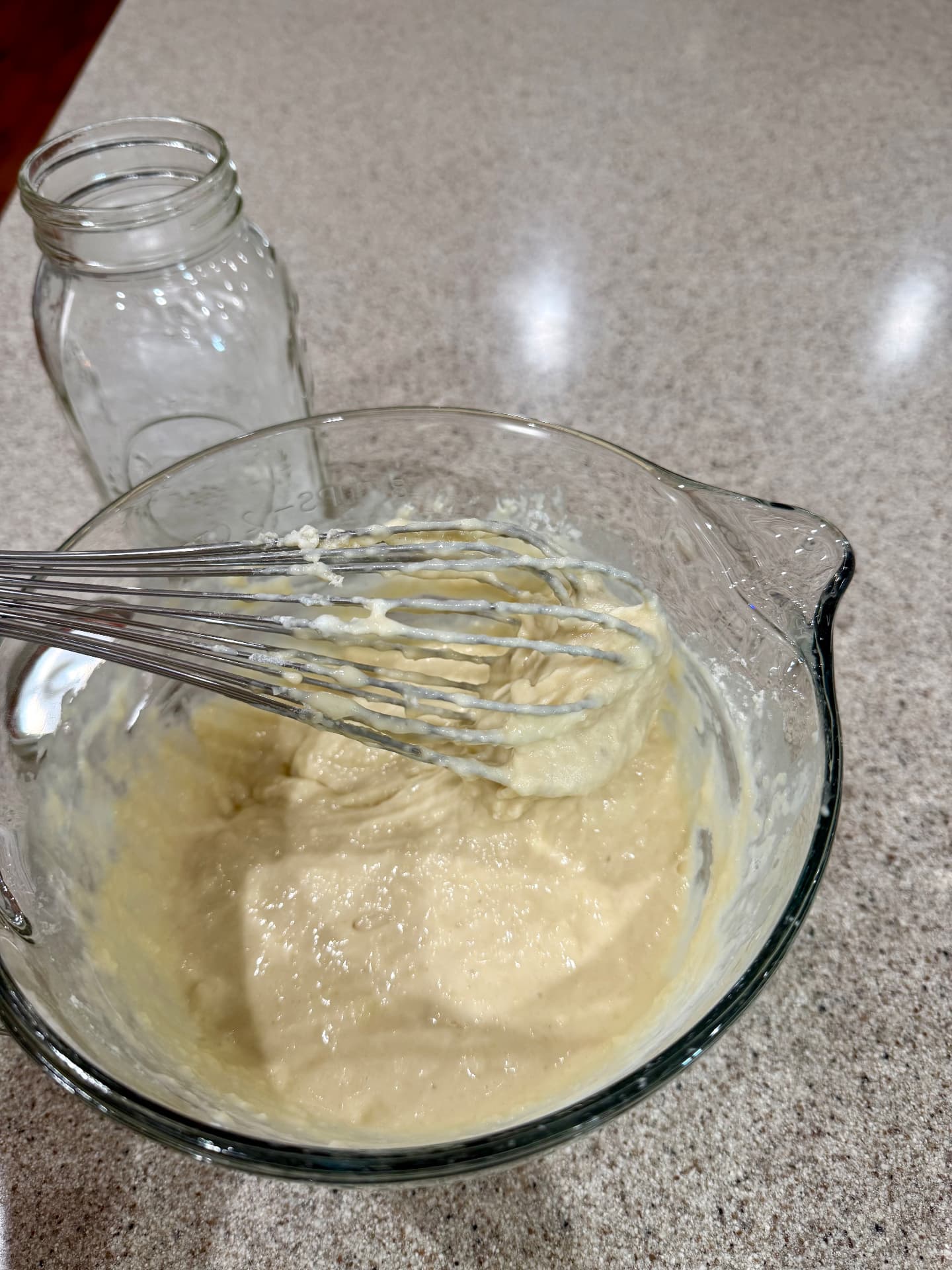 Finished pancake batter in a bowl, thick but pourable.
