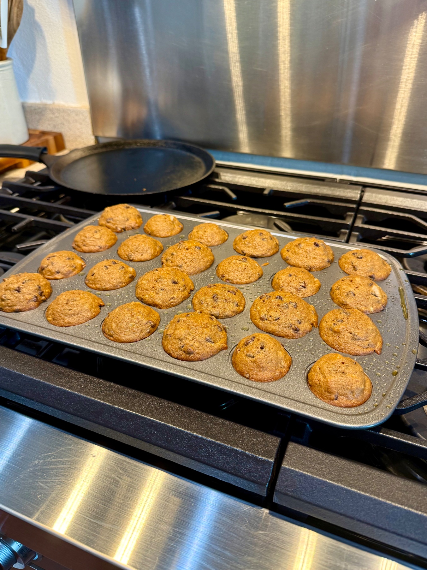 Banana pumpkin mini muffins baked in a mini muffin pan
