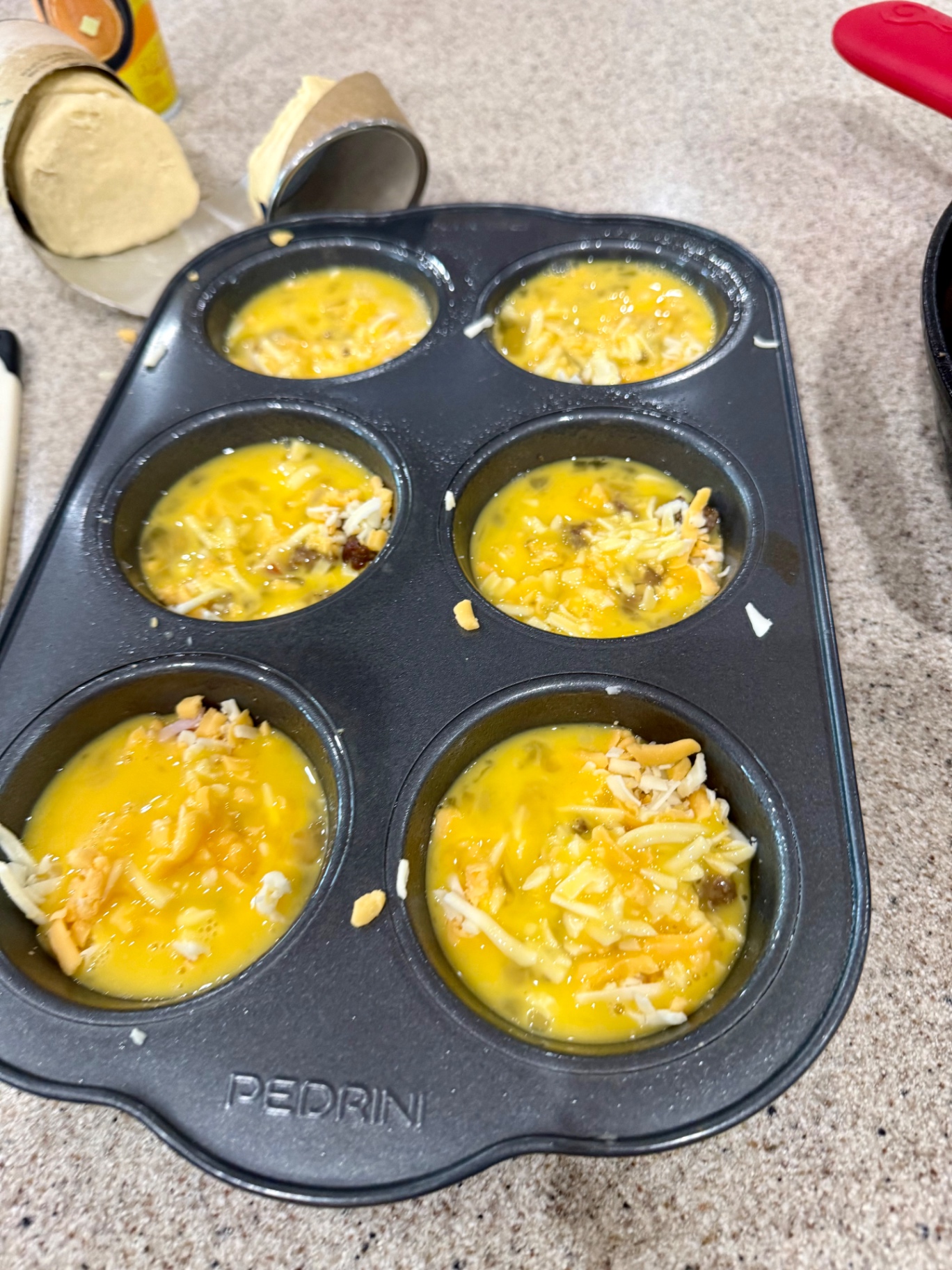 Beaten seasoned eggs added to breakfast biscuit filling.